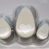 Detalle de las palancas con símbolo de corazón del pack Rayher