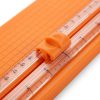 Detalle del deslizador naranja sobre la guía transparente de la mini cizalla A5