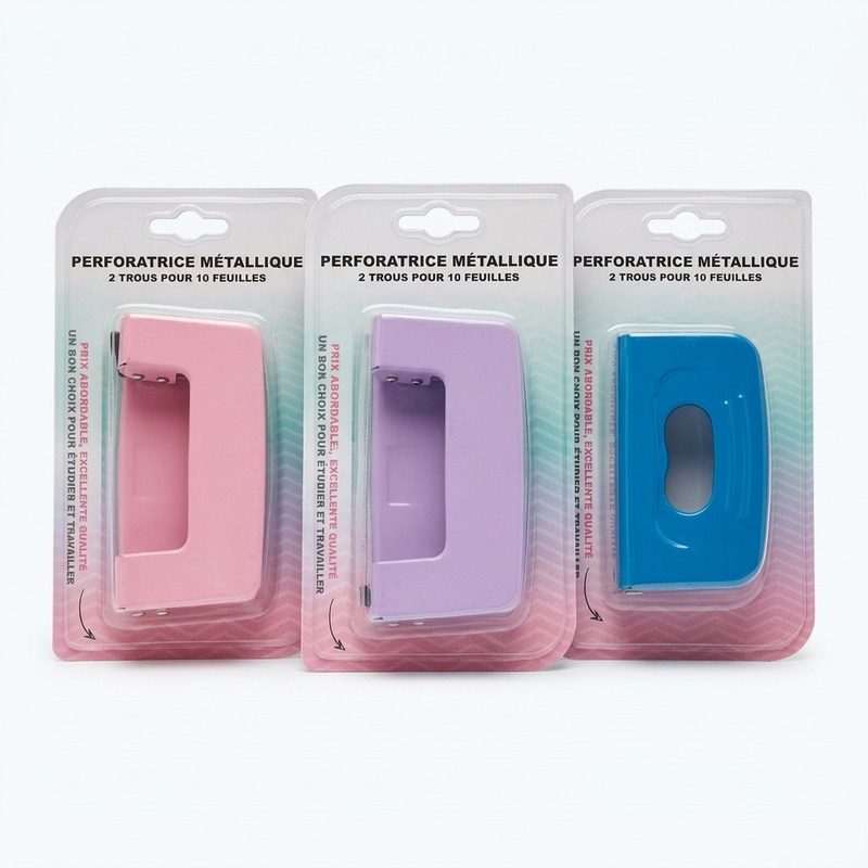 Perforadoras metálicas para papel en azul, morado y rosa, presentadas en sus embalajes