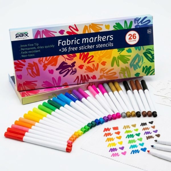 Rotuladores de colores desplegados junto a la caja del set de 26 colores