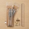 Set de papelería con pack de 2 bolígrafos grises, regla y clips
