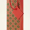 Lateral rojo de la bolsa de regalo geométrica para botella