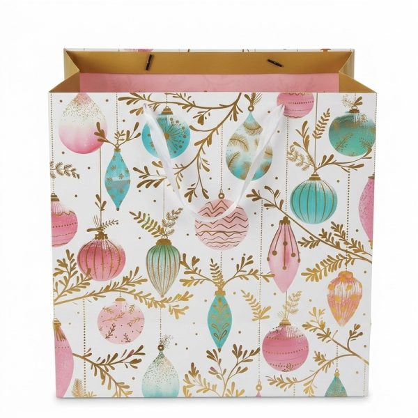 Bolsa de regalo navideña con bolas rosas y turquesas, vista principal