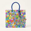 Bolsa de regalo azul con globos, asas y tarjeta, vista frontal
