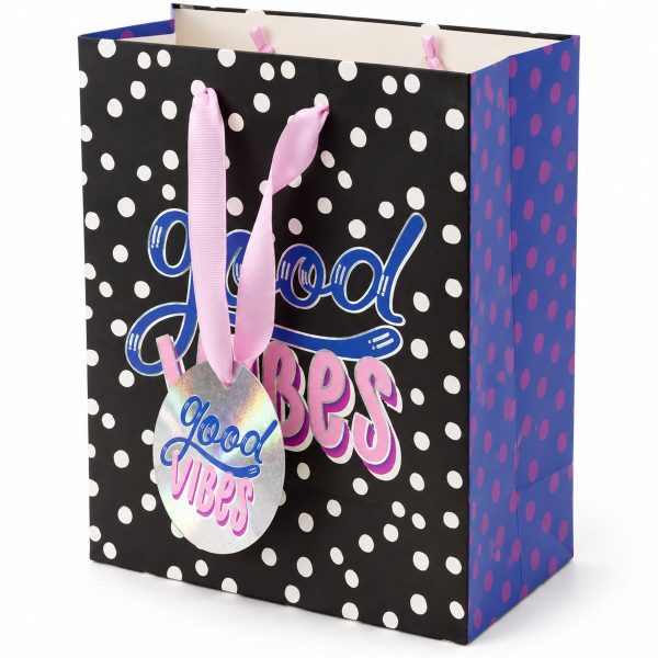 Bolsa Good Vibes - vista lateral Vista lateral de bolsa Good Vibes con lateral azul y lunares rosas