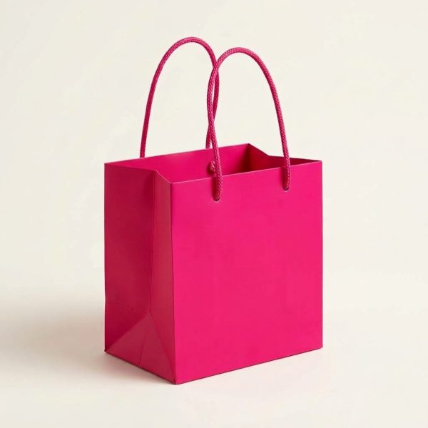bolsa-regalo-rosa-fucsia-lisa-lateral Bolsa de regalo rosa fucsia lisa con asas de cordón, vista lateral