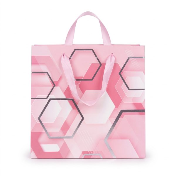 Bolsa de regalo rosa con hexágonos plateados y asas de cinta rosa