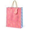 Bolsa de regalo rosa con piñas doradas, vista principal