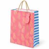 Bolsa de regalo rosa con piñas doradas, vista lateral
