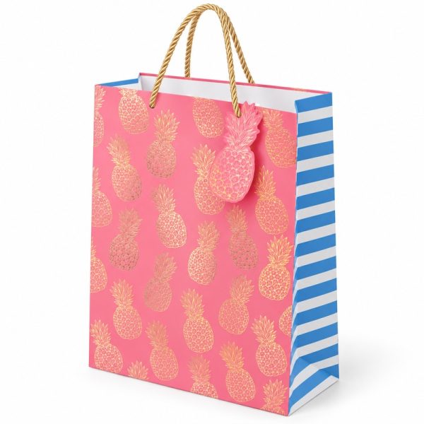 Bolsa de regalo rosa con piñas doradas, vista lateral