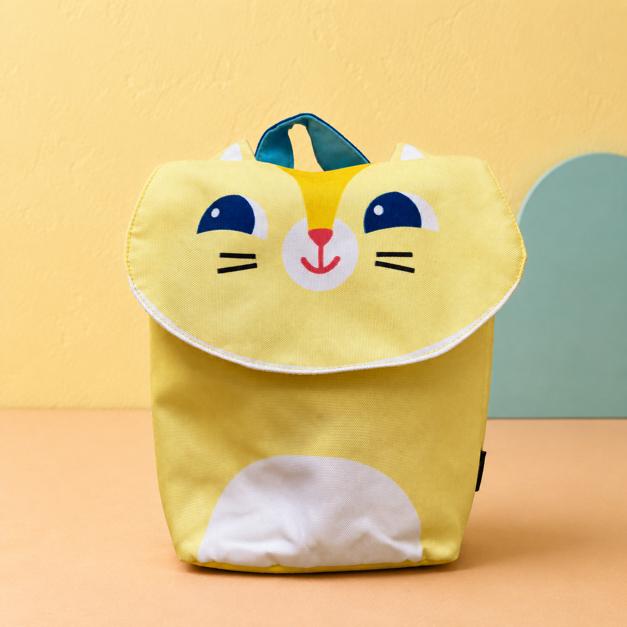 Mochila infantil gato amarillo - vista frontal Mochila infantil amarilla de gato con orejas