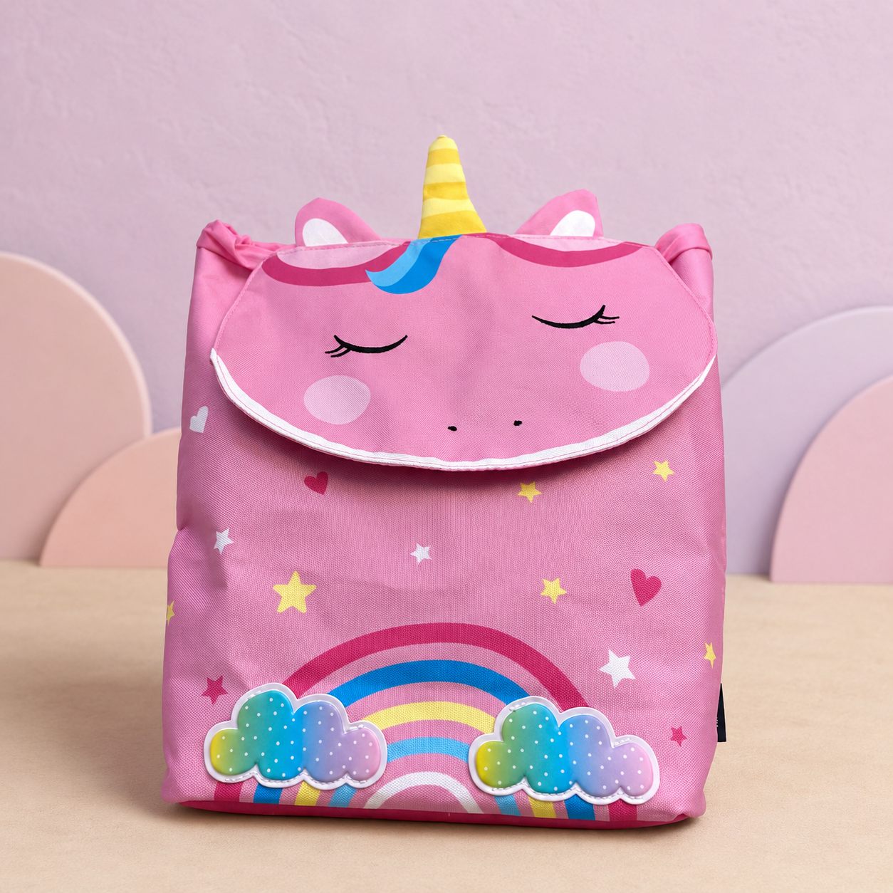 Mochila infantil unicornio rosa - vista frontal Mochila infantil rosa de unicornio con arcoíris