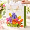 Bolsa de regalo con tulipanes multicolor, en uso