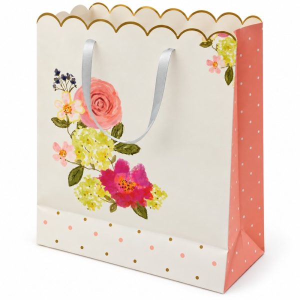 Bolsa de regalo floral con borde ondulado dorado y lateral rosa — vista lateral